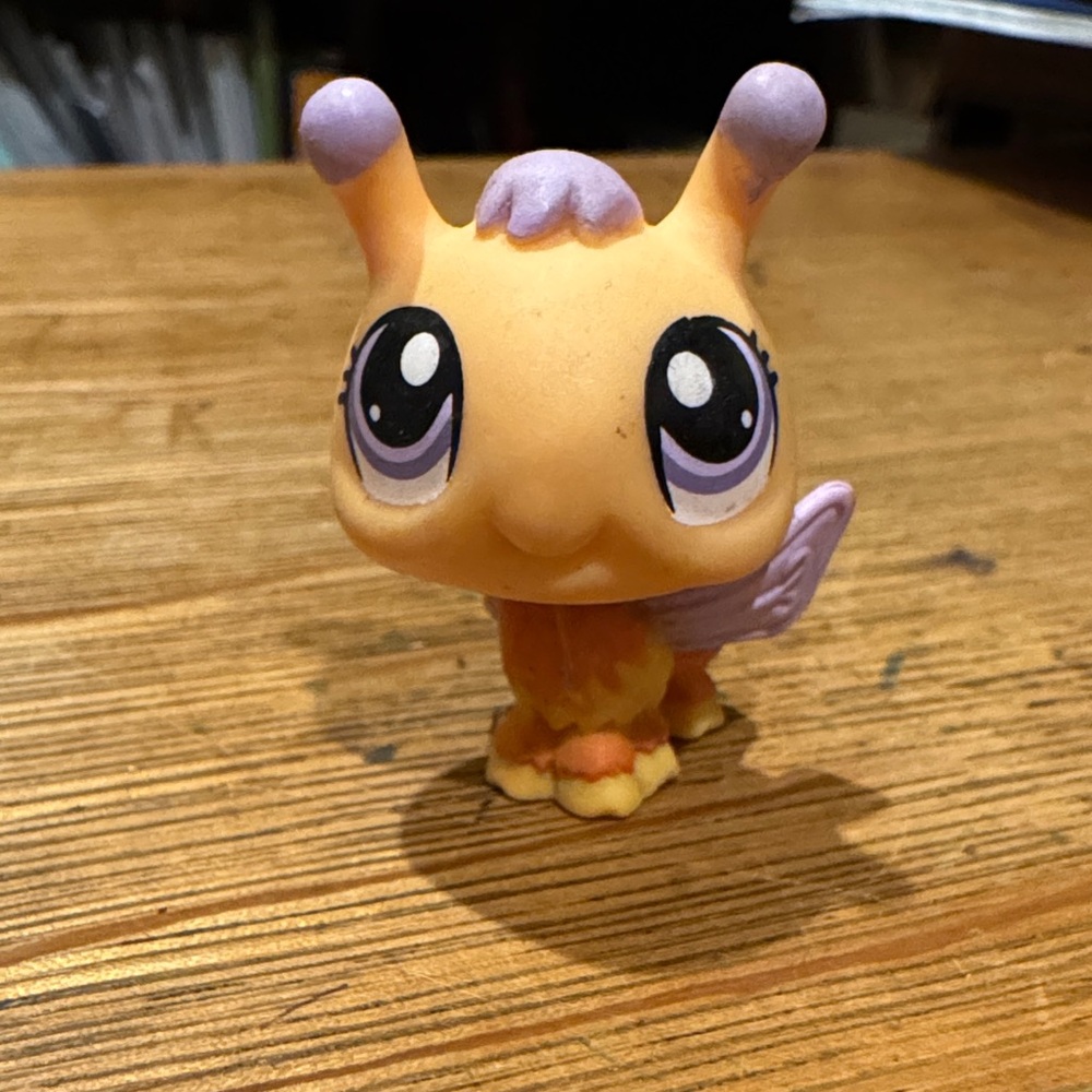 Adorable Orange and Purple Small Pet Figurine